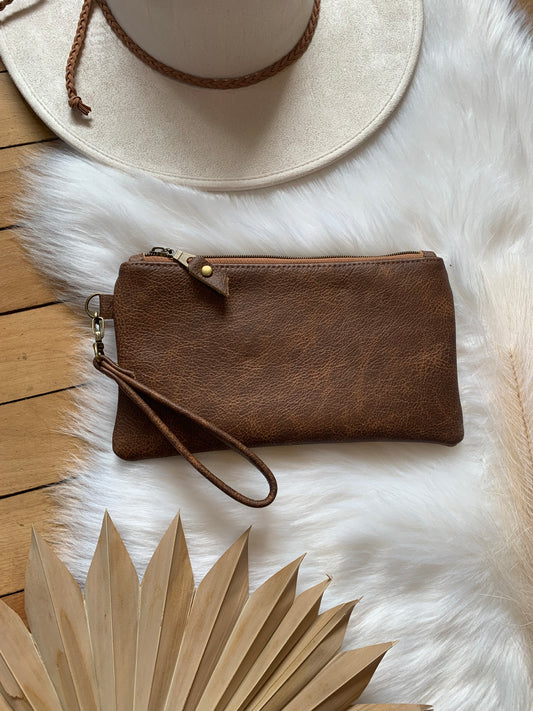 Saddle brown two toned leather clutch wristlet